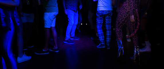 Dancing people at gay night club