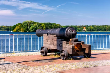Tapeten cast-iron cannon on a gun carriage on the lake promenade in Berlin-Tegel © Stephan Röger