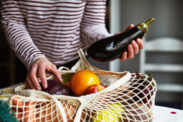 Fruit and vegetables on a string shopping bag