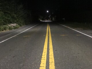 A creepy scary road at night 