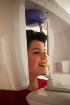 Boy in panoramic x-ray machine