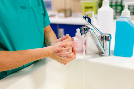 Nurse washing hands at the hospital