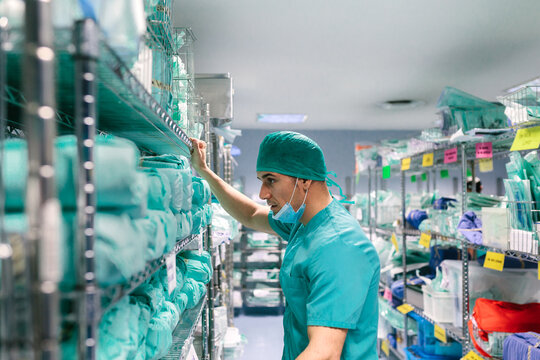 Nurse looking for medical equipment in the warehouse