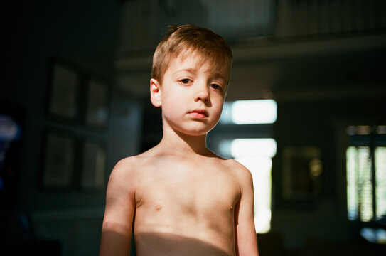 Portrait of a young boy without a shirt