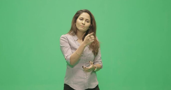 Studio, slow motion, green screen, a laughing female lecturer listens to her audience, London, UK