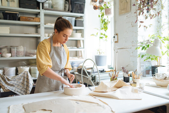 Woman master ceramist at work