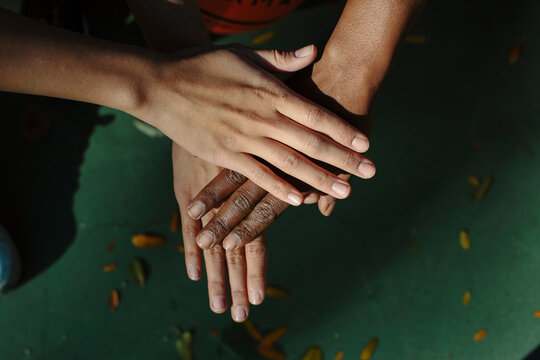 Three hands together