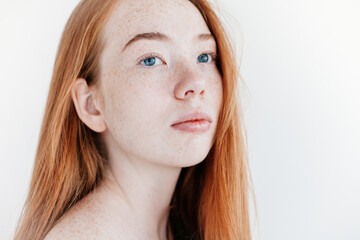 Topless redhead young woman with freckles