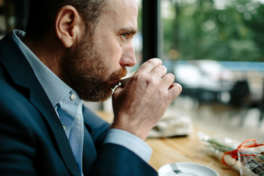 Adult man drinking coffee
