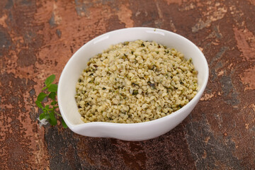 Peeled hemp seeds in the bowl