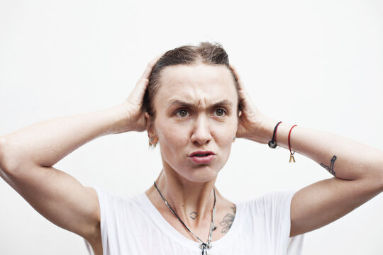 Young woman with aggressive facial expression