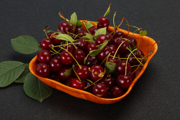 Sweet ripe cherry with leaves