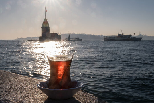 Istanbul symbols: Maiden&not;&yen;s Tower (K&fnof;&plusmn;z Kulesi), a vapur and a tea on the Bosphorus