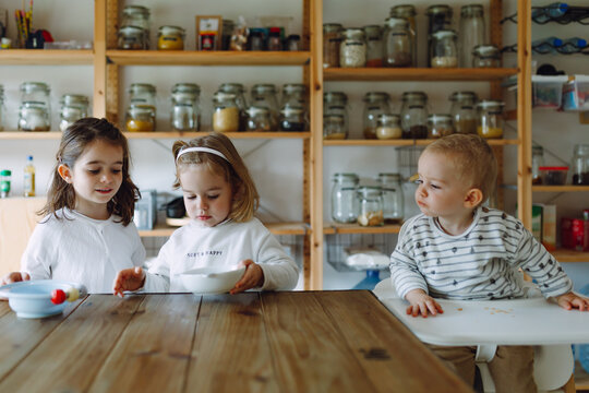 Three kids in the kitchen