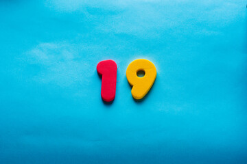 19 years old celebrating classic logo. Colored happy anniversary 19 th template red yellow numbers....