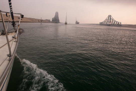 a yacht crossing the suez canal