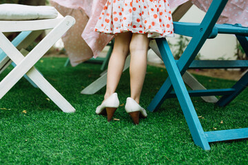 Girl in woman's shoes