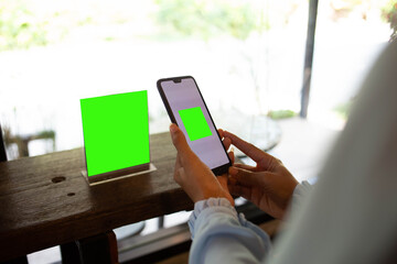 Employees are scanning QR codes to pay in coffee shop.concept