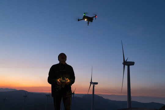 a man is landing his drone