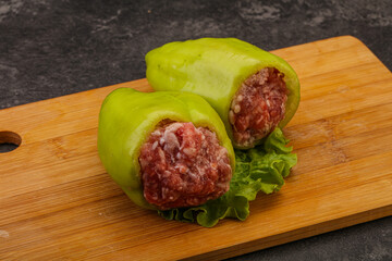 Raw stuffed pepper for cooking