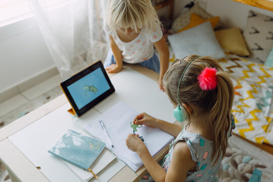 Girls studying at home