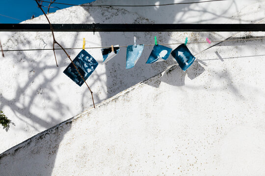 Artistic blueprints hanging to dry