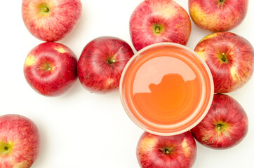 ripe apples and fresh juice in a glass