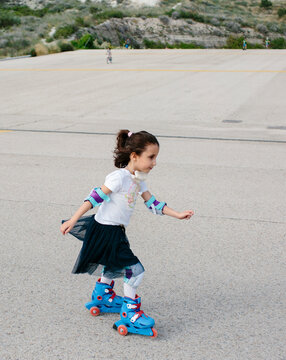 Kid inline skating outdoors