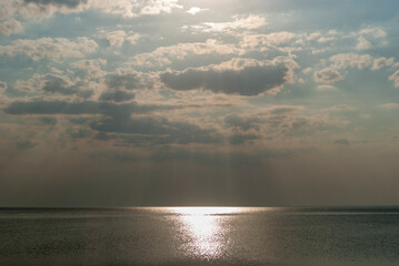 the coast of the sea of azov washes warm waves under the sun