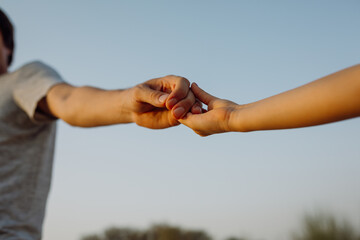 Hands holding together