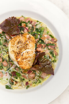 Cod with bean stew