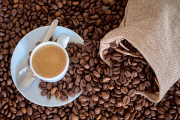 cup of coffee with coffee beans