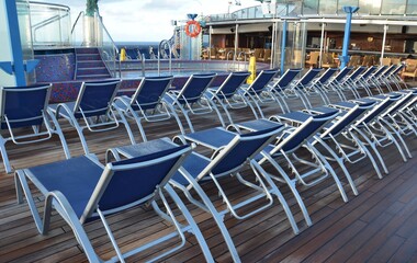 empty deck chairs on cruise ship