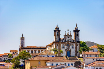 Bottom view of the historic center of Ouro Preto city with its houses, church, monuments and mountains