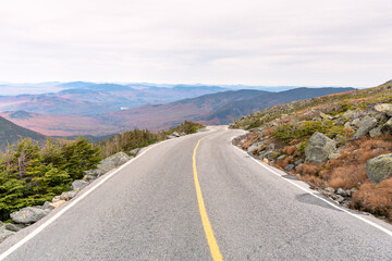 Steep high mountain road on a cloudy autumn day. Mount Washington, NH, USA.