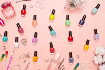 concept, manicure with nail polish, pedicure on pink background, copy space, Flat Lay