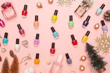christmas concept, new year, manicure with nail polish, pedicure on pink background, copy space, Flat Lay