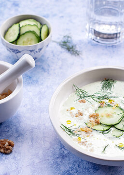 From above cold cucumber and dill soup named Tarator on rustic table