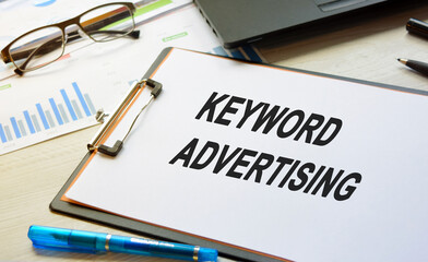 The inscription on business subjects on a white blank lying on the desktop with equipment. Business concept.