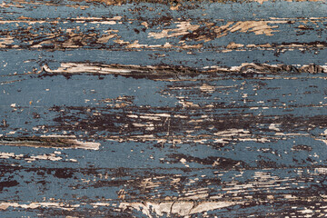 The texture of the old painted wood planks. Ragged, shabby, old blue boards.