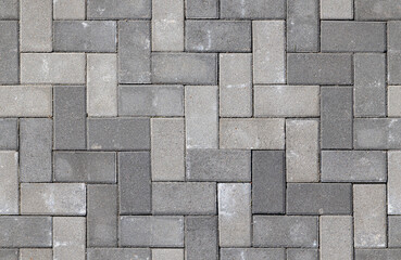 Seamless texture of street tiles. Pattern of gray sidewalk tiles.