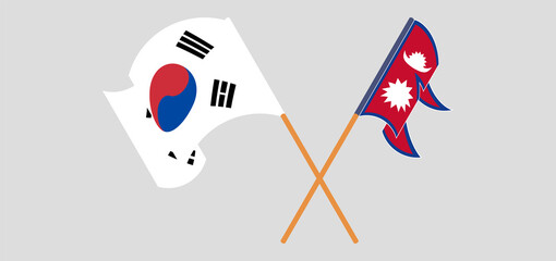 Crossed and waving flags of Nepal and South Korea