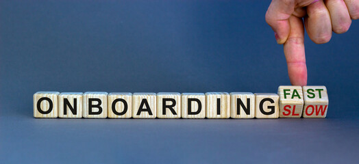 Hand turns cubes and changes words 'onboarding slow' to 'onboarding fast' or vice versa. Beautiful...