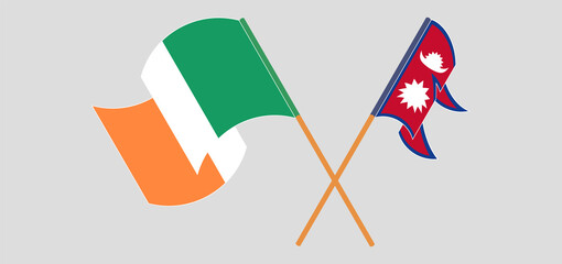 Crossed and waving flags of Nepal and Ireland