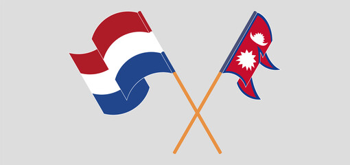 Crossed and waving flags of Nepal and the Netherlands