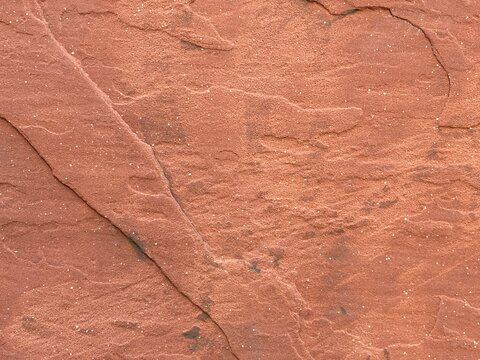 Abstract background texture, surface of reddish-brown rock, suitable for compositing and graphics