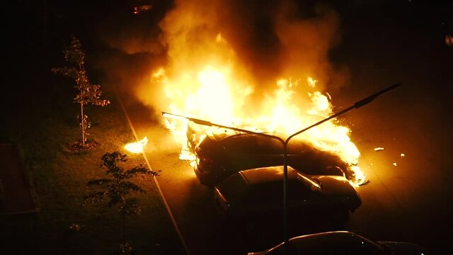 Fire. The car caught fire in the parking lot.