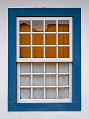 Ancient colonial window in Tiradentes, Minas Gerais, Brazil