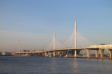 Fototapeta na wymiar Big white bridge over the river
