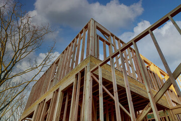 Framing beam of new house under construction home framing